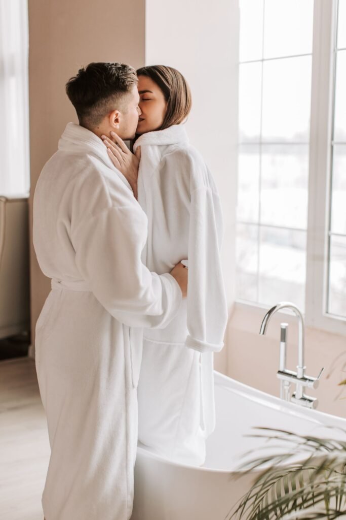 Couple in matching white bathrobes