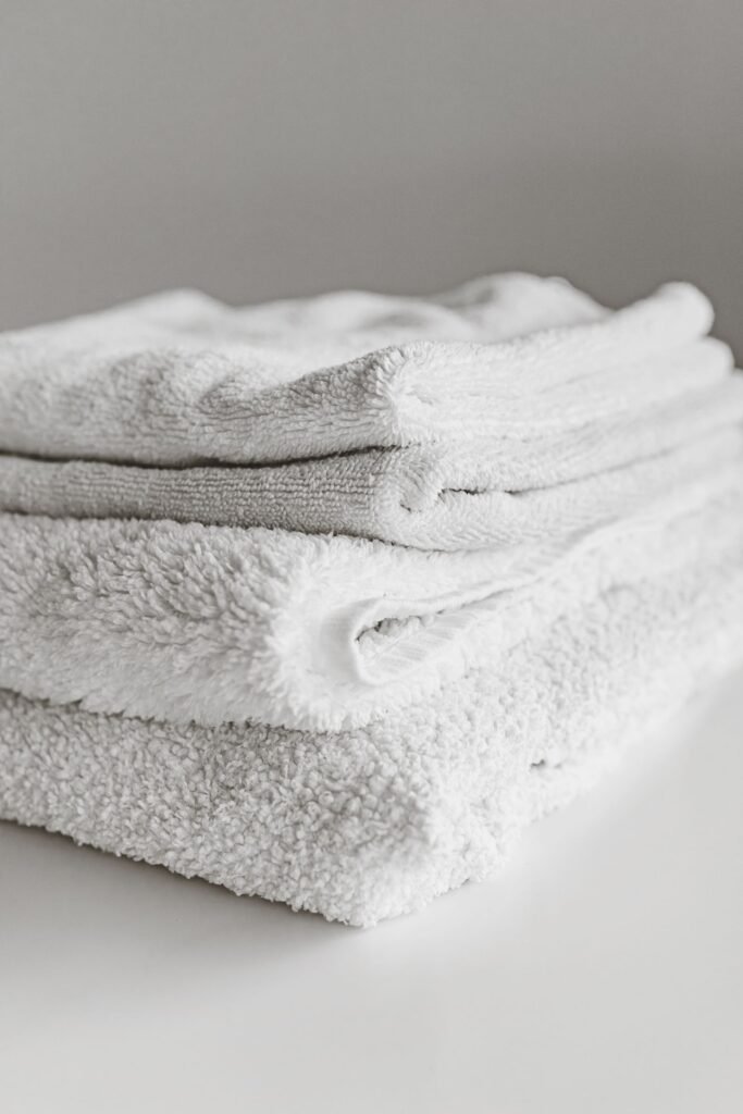 Neatly folded white spa towels
